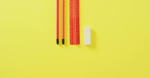 Video Pencils Ruler Eraser Yellow Background School Equipment Tools Learning — стоковое видео