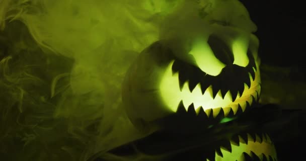 Video Halloween Carved Pumpkin Smoke Green Light Black Background Halloween — Stockvideo