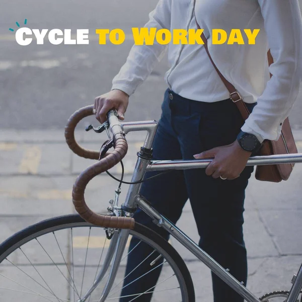 Composite of cycle to work day text and midsection of caucasian businessman with bicycle on street. business, commuter, transportation, awareness, healthy and sustainable concept.