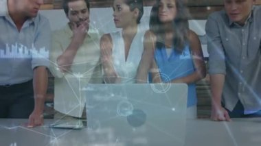 Animation of network of connections over caucasian business people in office. Global business and digital interface concept digitally generated video.