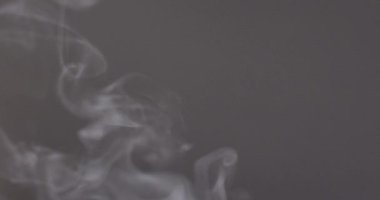 Video of white cup of hot black coffee over black background. Coffee, refreshment and beverages.