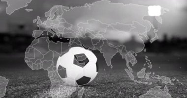 Animation of moving world map over football ball. World cup soccer concept digitally generated video.