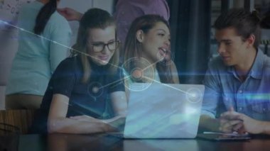 Animation of network of connections over caucasian business people in office. Global business and digital interface concept digitally generated video.