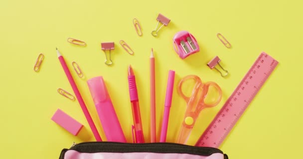 Video Pink School Accessories Pink Case Yellow Surface School Equipment — стоковое видео