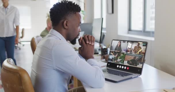African American Man Using Laptop Video Call Diverse Business Colleagues — Αρχείο Βίντεο