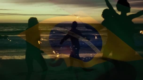 Composite Video Waving Brazil Flag Group Friends Sparklers Dancing Beach — Video