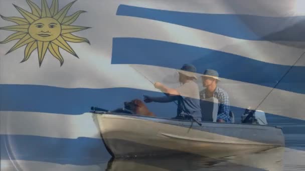 手術室で外科医に手を振っているウルグアイの旗のアニメーション 軍の防衛と愛国心の概念デジタル生成されたビデオ — ストック動画