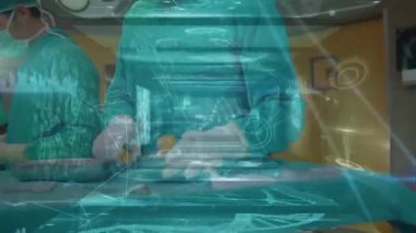 Animation of connected lines and data with various medical screens over caucasian surgeons. Animation, composite, occupation, operating room, surgeon, teamwork, technology, surgery.