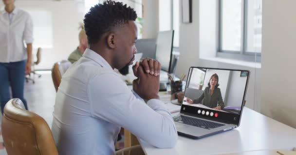 African American Man Using Laptop Video Call Business Colleague Screen — Αρχείο Βίντεο