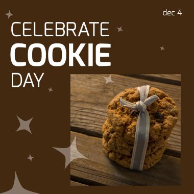 Composite of dec 4 and celebrate cookie day text with cookies tied with ribbon on wooden table. Copy space, biscuits, sweet food, abstract, stars and holiday concept.