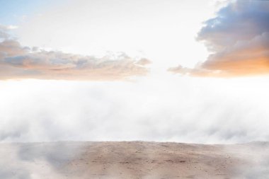 empty white clouds on the beach