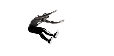 Full length of sportsman long jumping against white background