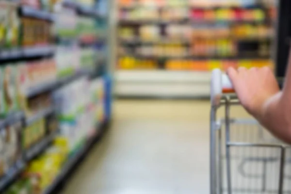 Cropped Image Person Shopping Cart Aisle Supermarket —  Fotos de Stock