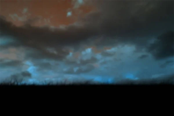Silhouette Grassy Field Dark Stormy Clouds — Foto Stock