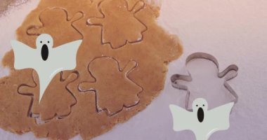 Animation of ghosts over cookies dough and mold. baking, desserts and halloween concept digitally generated video.