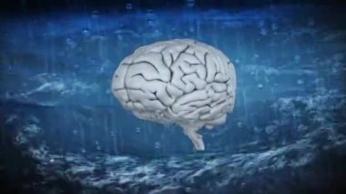 Human brain icon spinning against rain over sea waves in background. mental health day awareness concept