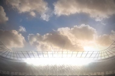 composite image of rugby stadium against cloudy sky