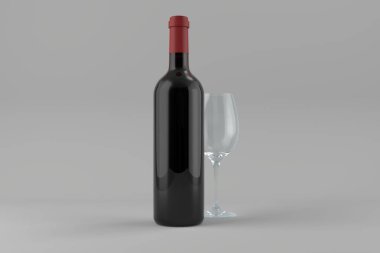 Alcohol bottle and wineglass on gray background