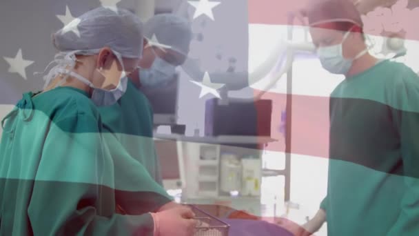 在不同的外科医生身上升起美国国旗 全球医学 医疗保健和数字界面概念数字生成视频 — 图库视频影像