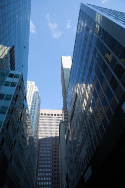 Low angle view of modern office buildings against sky