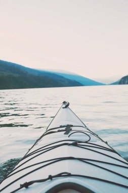 Cropped image boat sailing on lake against sky