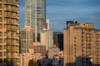 Blurry view of cityscape during summer