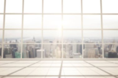 Digital composite image of city seen though glass window of office building