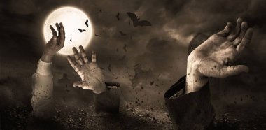 Digital composite image of cropped hands against cloudy sky at cemetery during night