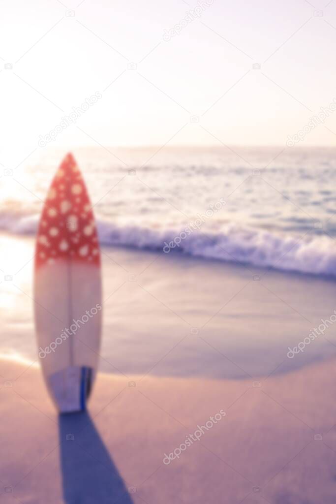 Surfboard on beach shore during day