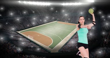 Beyaz tenli kadın hentbolcunun aydınlanmış stadyuma top fırlatırken çekilmiş dijital görüntüsü. Kopyalama alanı, takım sporu, top sporu, rekabet, dünya şampiyonluğu, kararlılık.