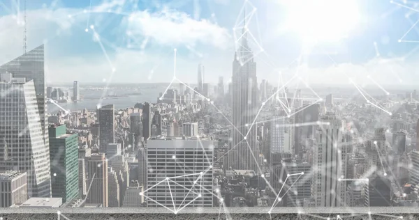 Image of icons with network of connections over cityscape background. global networks, connections and technology concept digitally generated image.