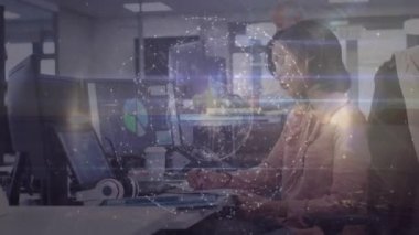 Animation of shapes over diverse business people in office. Global business and digital interface concept digitally generated video.