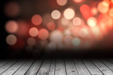 Shimmering light design over boards with copy space