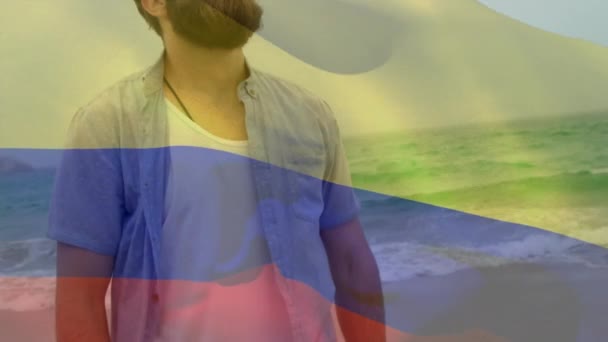 Video Composito Sventolare Bandiera Colombiana Uomo Caucasico Con Occhio Chiuso — Video Stock