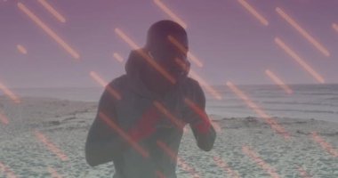 Sahilde yumruk atan Afro-Amerikan bir adamın çizgi animasyonu. sağlık ve zindelik kavramı dijital olarak oluşturulmuş video.