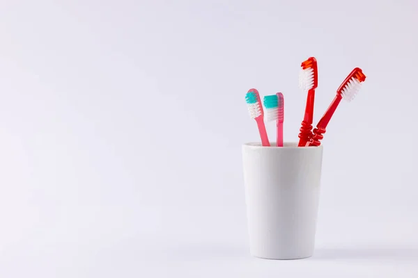 Image Toothbrushes Cup Grey Background Health Dentistry Dental Accessories Taking — Stock Photo, Image