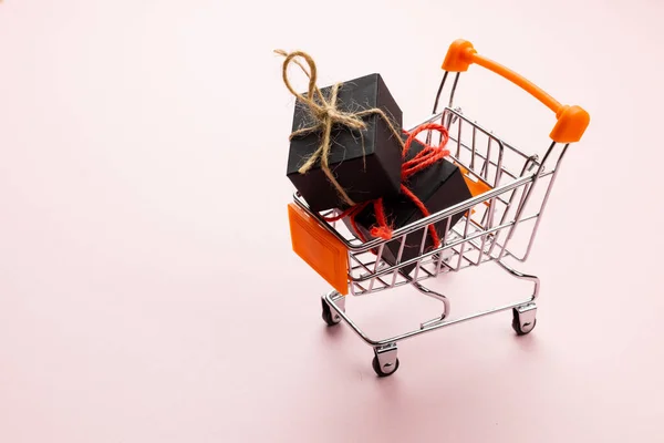 Composition Shopping Cart Presents Pink Background Retail Shopping Black Friday — Stock Photo, Image