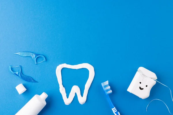 Image Toothbrush Toothpaste String Liquid Tooth Made Paste Blue Surface — Stock Photo, Image