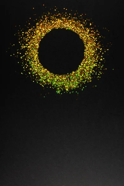 Composition of circle of gold spots on gray background. Retail, shopping and black friday concept.