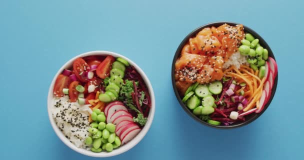 Composition Bowls Rice Salmon Vegetables Blue Background Food Drink Colour — Stock Video