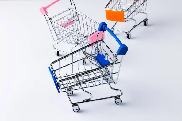 Composition Shopping Carts Copy Space White Background Retail Shopping Black — Stock Photo, Image