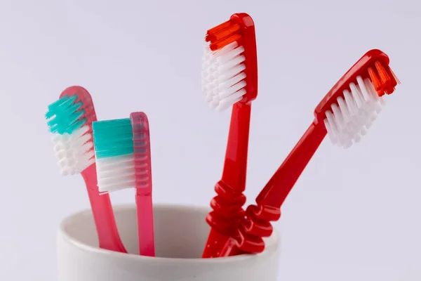 Image Toothbrushes Cup Grey Background Health Dentistry Dental Accessories Taking — Stock Photo, Image