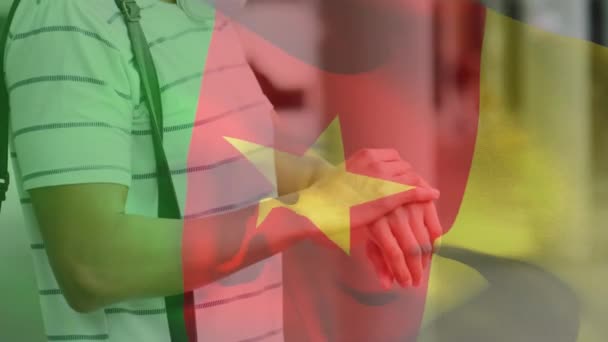 Animation Flag Cameroon Waving Latin Man Wearing Face Mask City — Stock Video