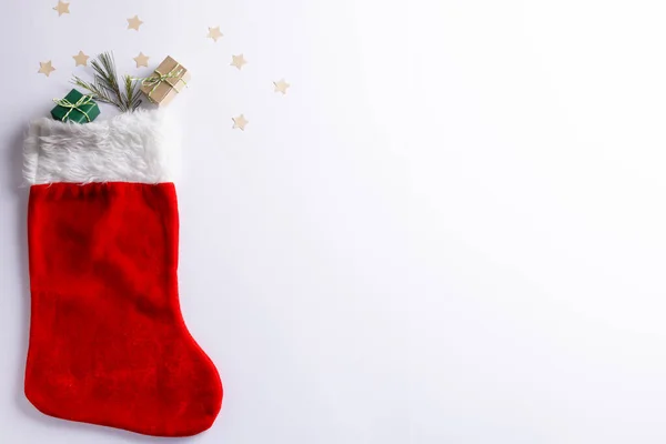 Εικόνα Από Χριστουγεννιάτικα Δώρα Χριστουγεννιάτικη Κάλτσα Και Αστέρια Χώρο Αντίγραφο — Φωτογραφία Αρχείου