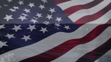 ABD bayrağı üzerinde deniz animasyonu. Küresel iş, vatanseverlik ve dijital arayüz kavramı dijital olarak üretilen video.