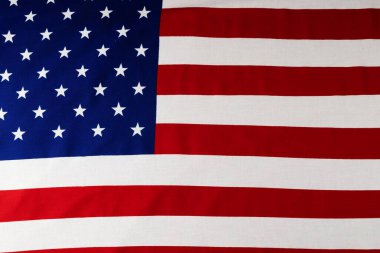 Buruşuk Amerikan bayrağının yakın plan görüntüsü. Ulusal bayraklar, vatanseverlik ve kutlama konsepti.