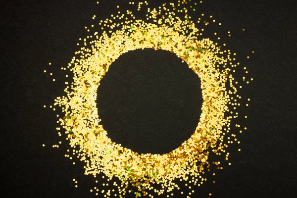 Composition of circle of gold spots on gray background. Retail, shopping and black friday concept.