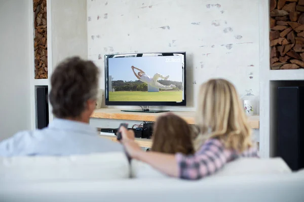 Rear View Family Sitting Home Together Watching Sport Event Sports — Stock Photo, Image