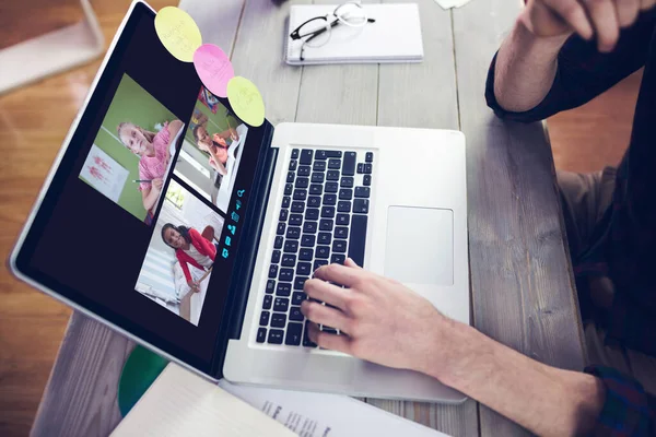 Müzik app midsection yaratıcı düzenleyicisinin üstünde laptop çalışma karşı