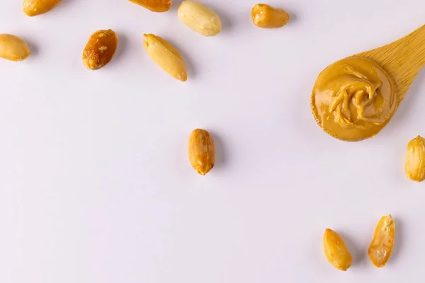 stock image Image of spoon with peanut butter and nuts on white surface. Food, breakfast, nutrition and american cuisine concept.